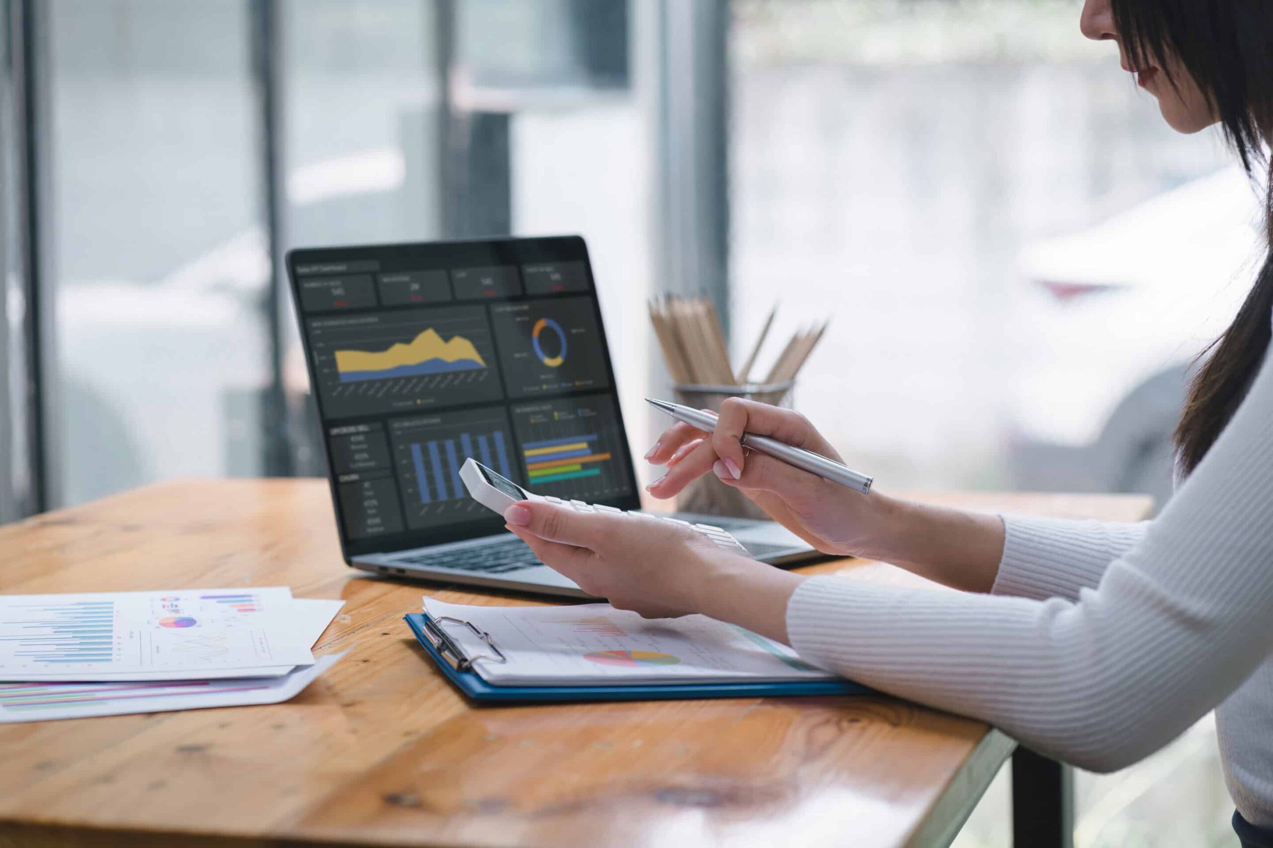 woman at table on laptop